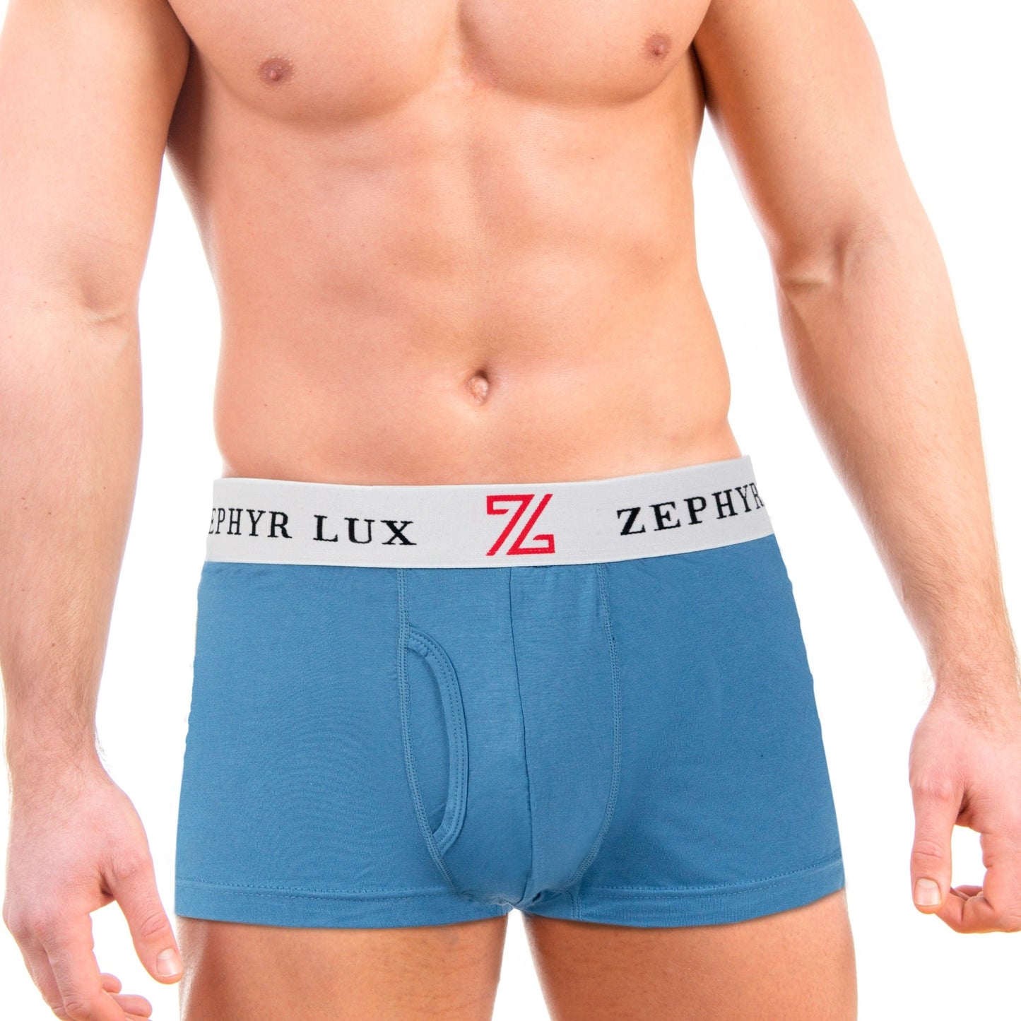Adult model wearing blue Zephyr Lux short-leg boxer briefs